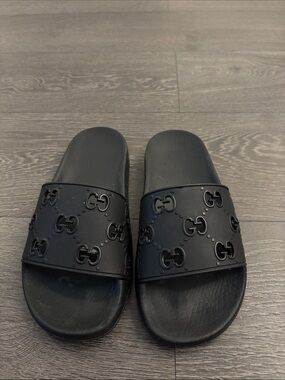Black Gucci GG Embossed Slide Sandals